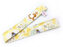 Pacifier Strap / Toy Strap Pooh Yellow