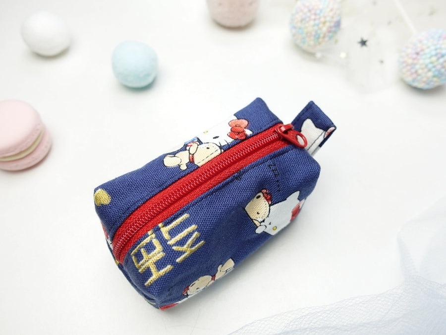 [LAST PIECE] Mini Poofy Pouch Hello Kitty Navy Gold